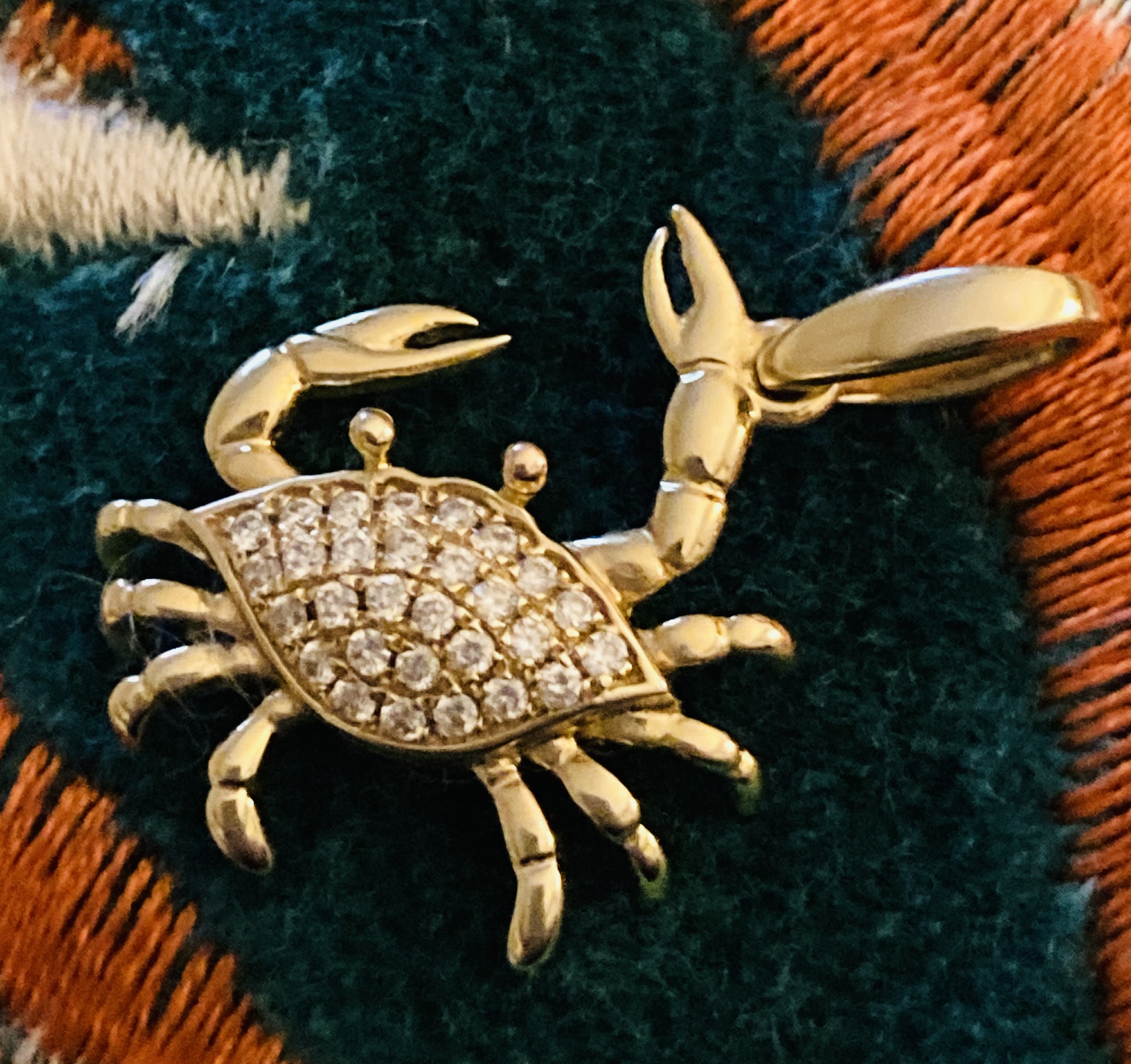 Diamond studded crab charm, or pendant. Set in 14k yellow gold.